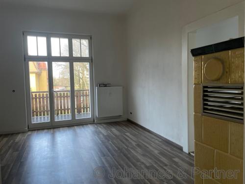 Wohnzimmer mit Kachelofen