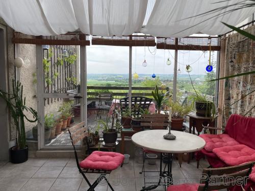Wintergarten mit Zugang zur Terrasse