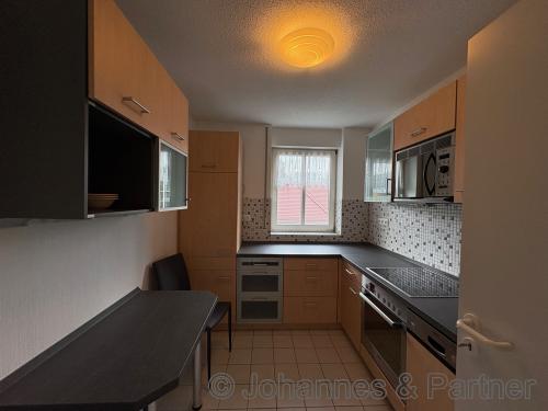 Küche mit Einbauküche