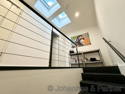 Treppe zur Galerie ins Obergeschoss