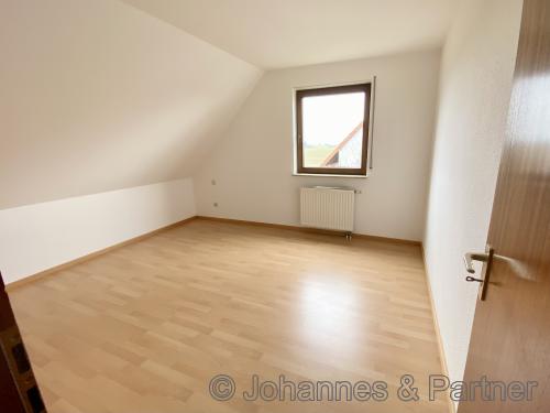 eines der Zimmer im Obergeschoss