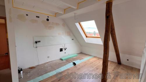 Zimmer mit offener Küche